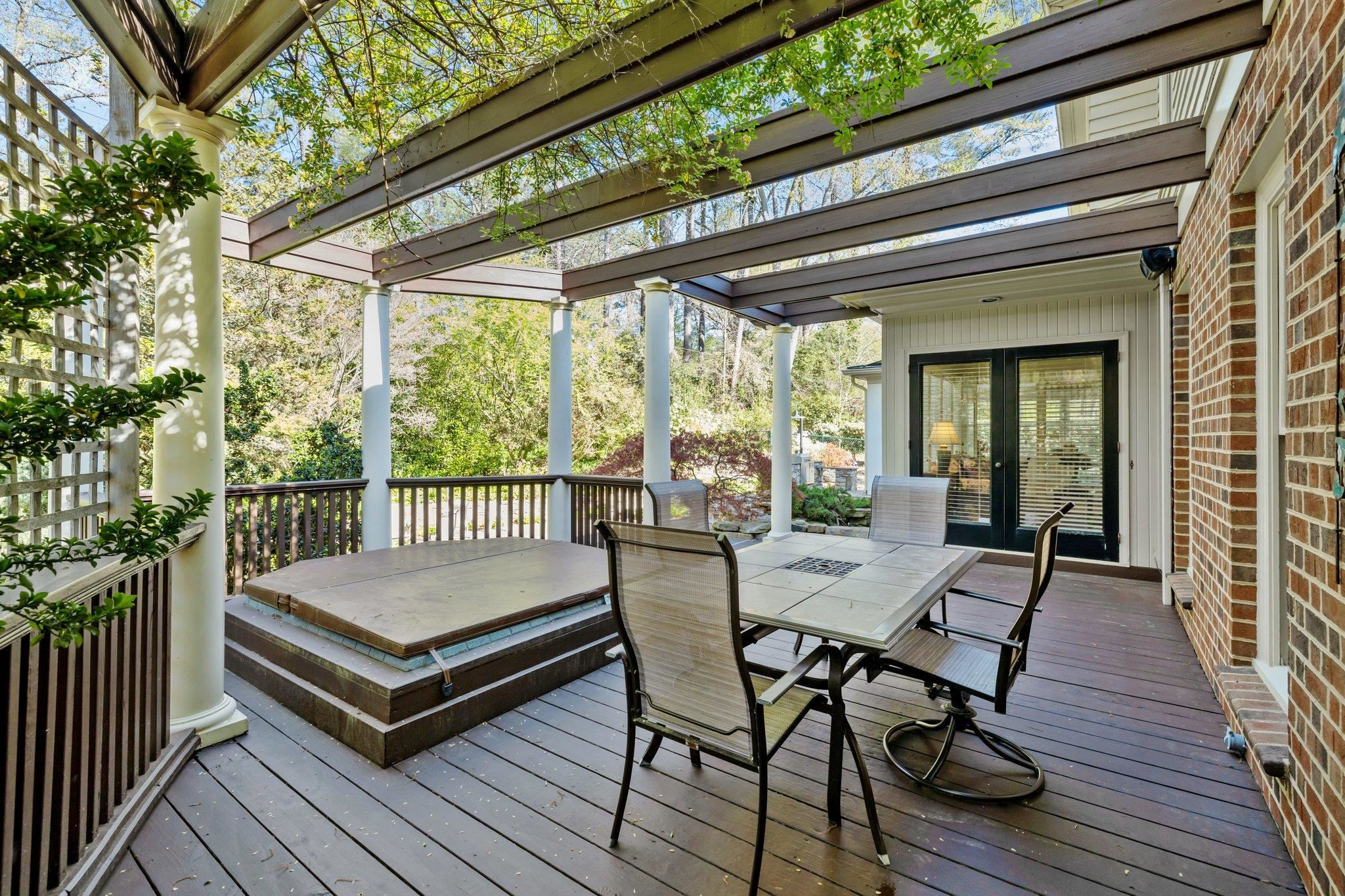 3608 Dover Road Durham, NC 27707 - Photo 56 of 60 a view of a wooden deck with furniture