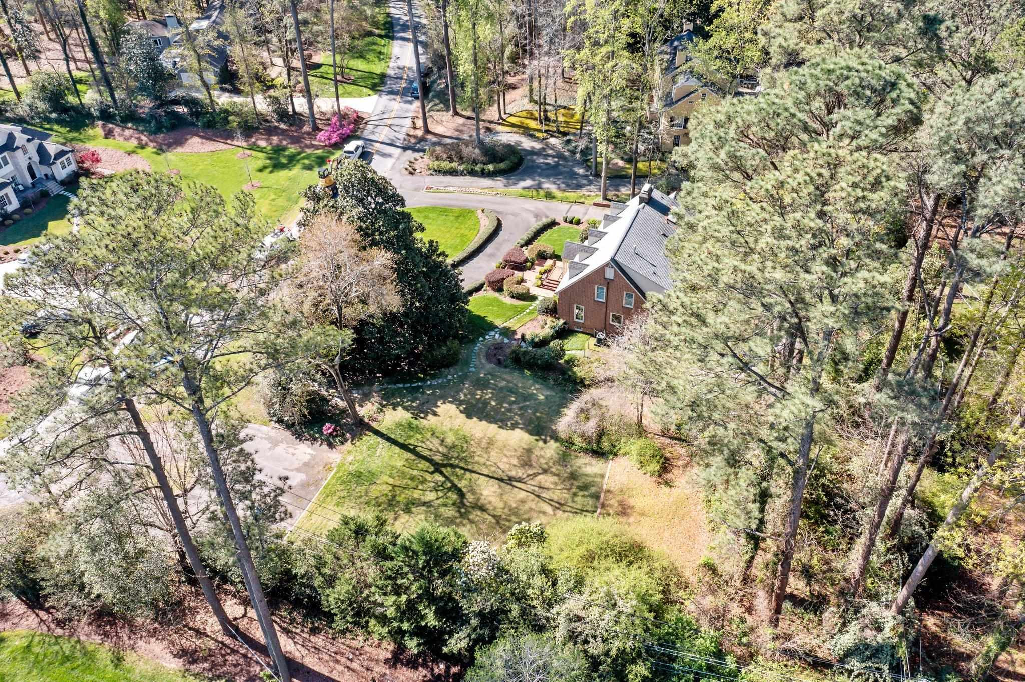 3608 Dover Road Durham, NC 27707 - Photo 58 of 60 a view of a house with a yard and sitting area