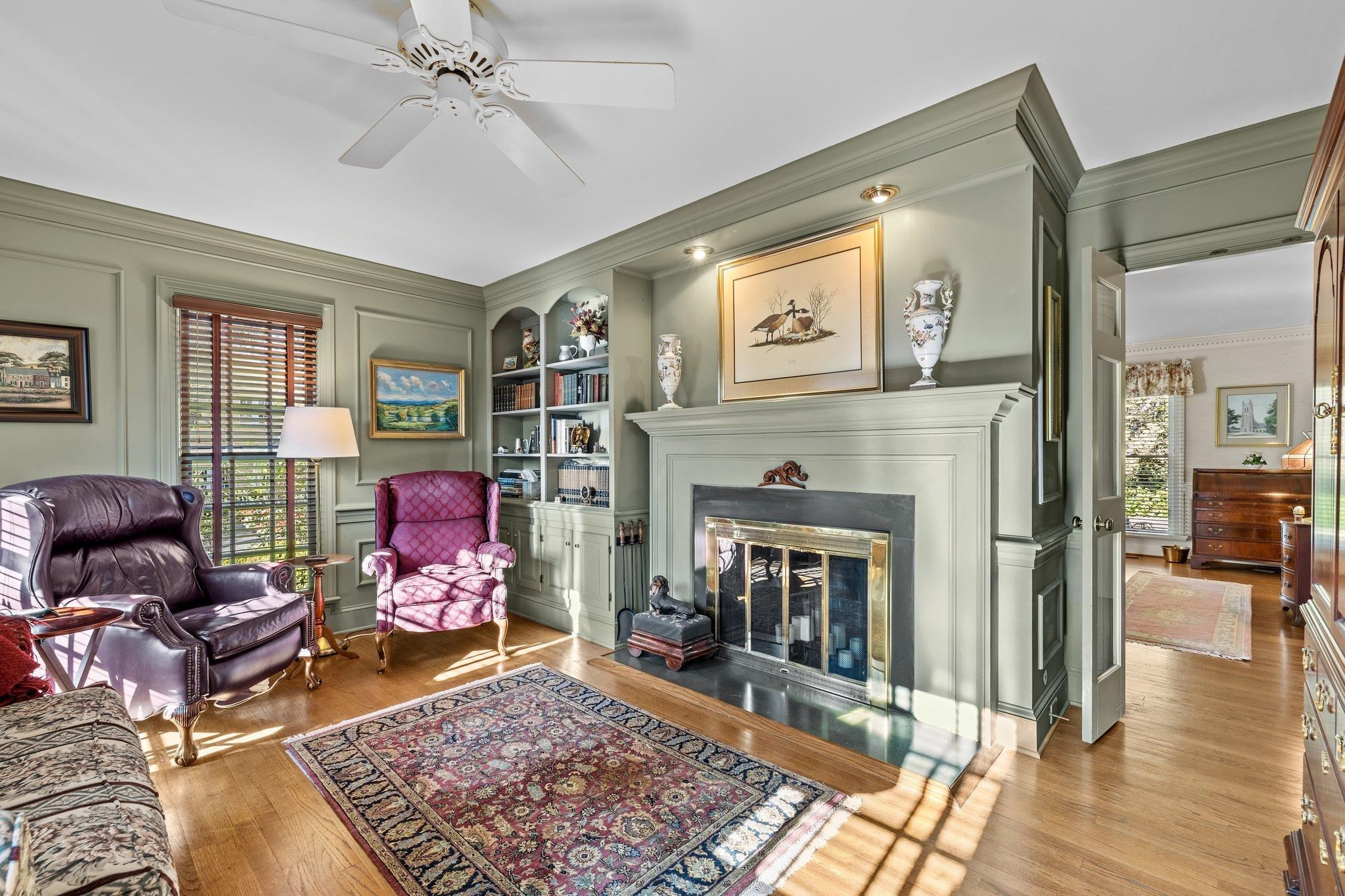 3608 Dover Road Durham, NC 27707 - Photo 10 of 60 a living room with furniture and a fireplace
