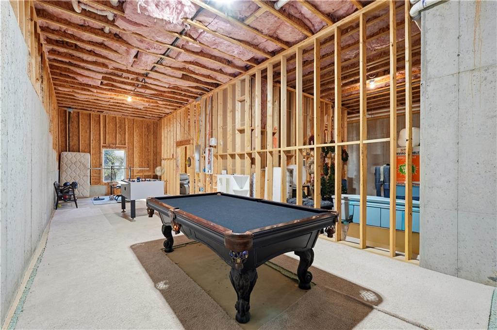 8745 Hightower Ridge Ball Ground, GA 30107 - Photo 24 of 36 a room with pool table and windows