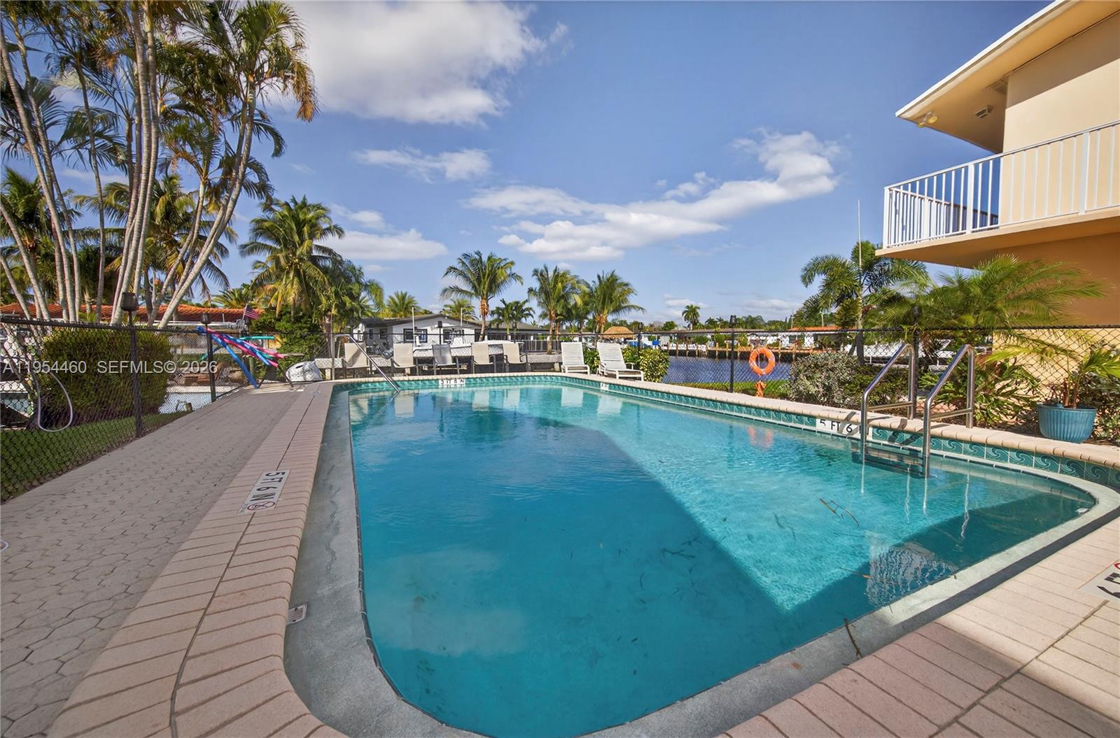331 East McNab Road, Unit 226 Pompano Beach, FL 33060 - Photo 27 of 29 a view of swimming pool with outdoor seating