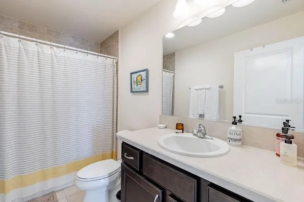 a kitchen with a sink a counter top space and appliances
