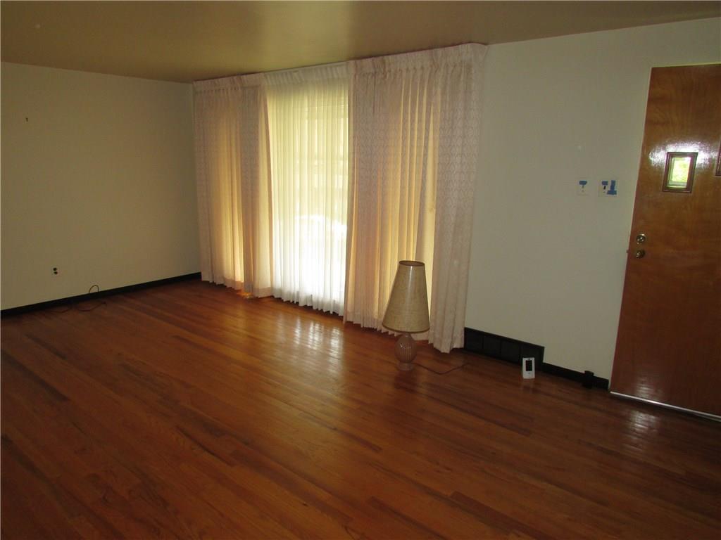 460 Livingston Road West Mifflin, PA 15122 - Photo 6 of 24 Living Room with beautiful hardwood floors
