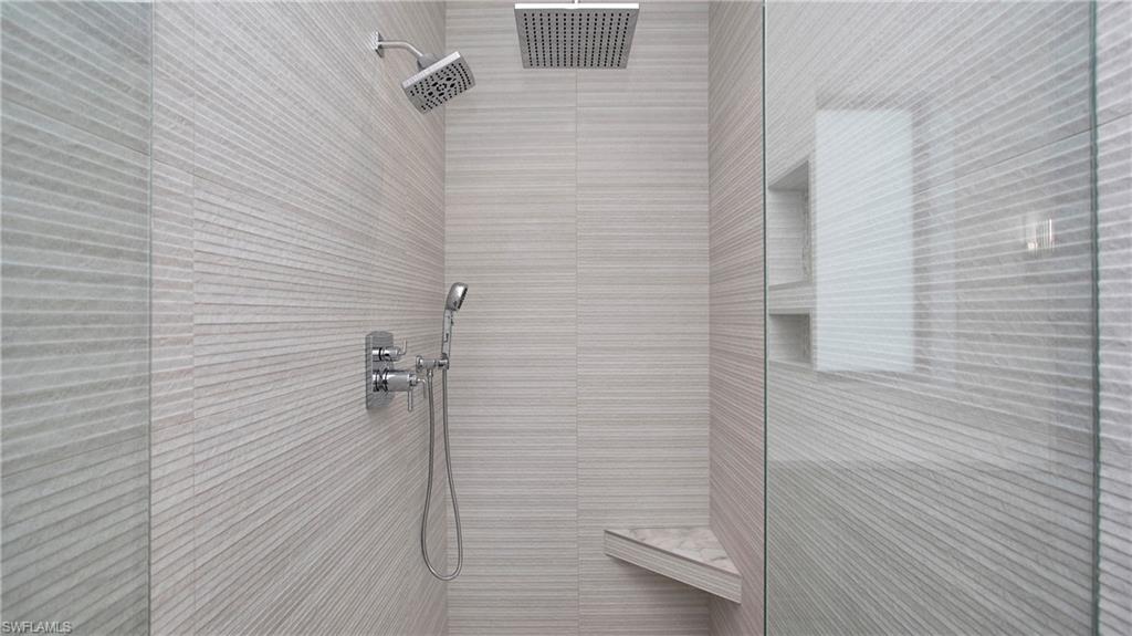 1798 Holiday Lane Naples, FL 34104 - Photo 18 of 47 Bathroom with a tile shower