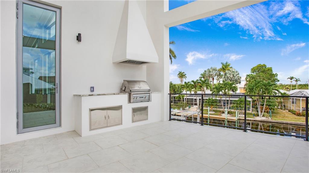 1798 Holiday Lane Naples, FL 34104 - Photo 29 of 47 View of patio / terrace featuring area for grilling