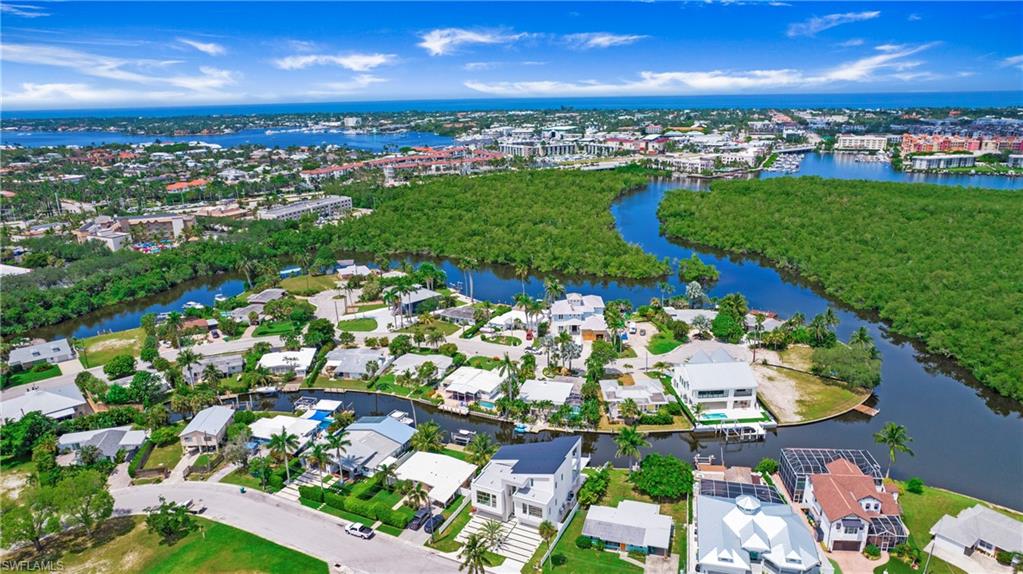 1798 Holiday Lane Naples, FL 34104 - Photo 42 of 47 Bird's eye view of a large body of water