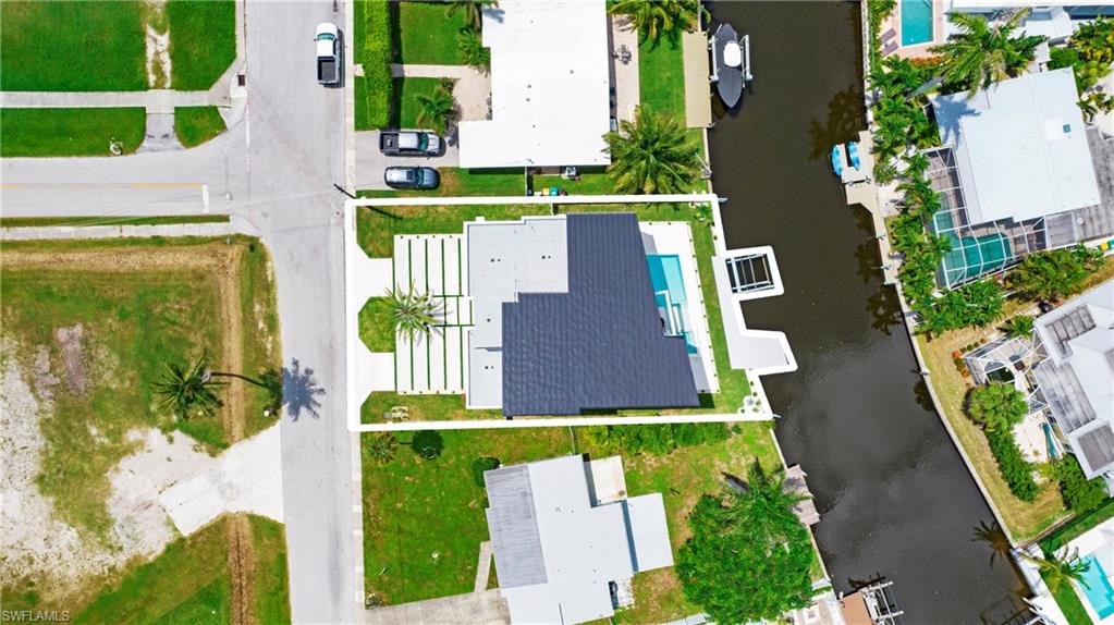 1798 Holiday Lane Naples, FL 34104 - Photo 43 of 47 Aerial view of property's location with property parcel outlined and a pool