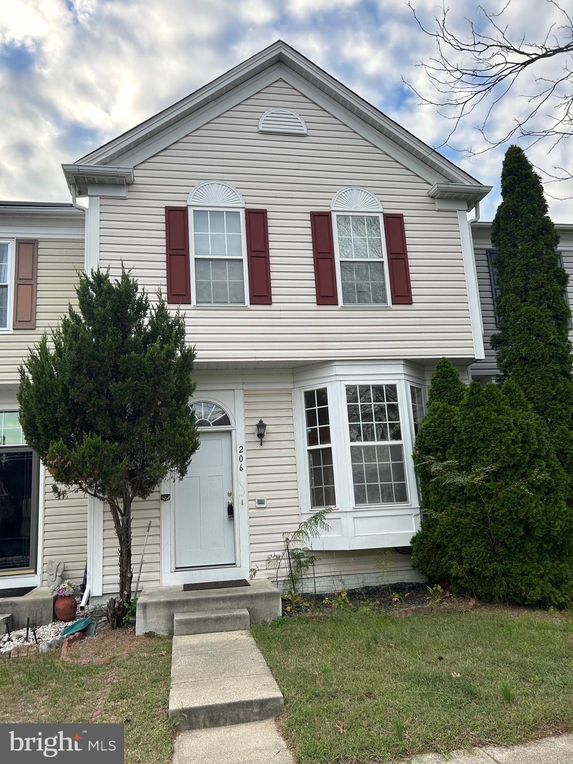 206 Arcadia Shores Circle Odenton, MD 21113 - Photo 1 of 15 a front view of a house with a yard