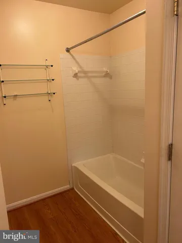 a bathroom with a bath tub