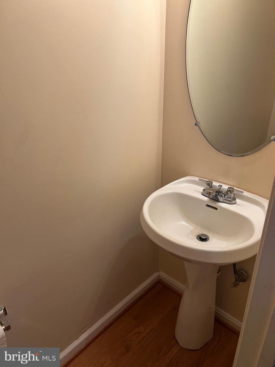 206 Arcadia Shores Circle Odenton, MD 21113 - Photo 12 of 15 a bathroom with a sink and mirror