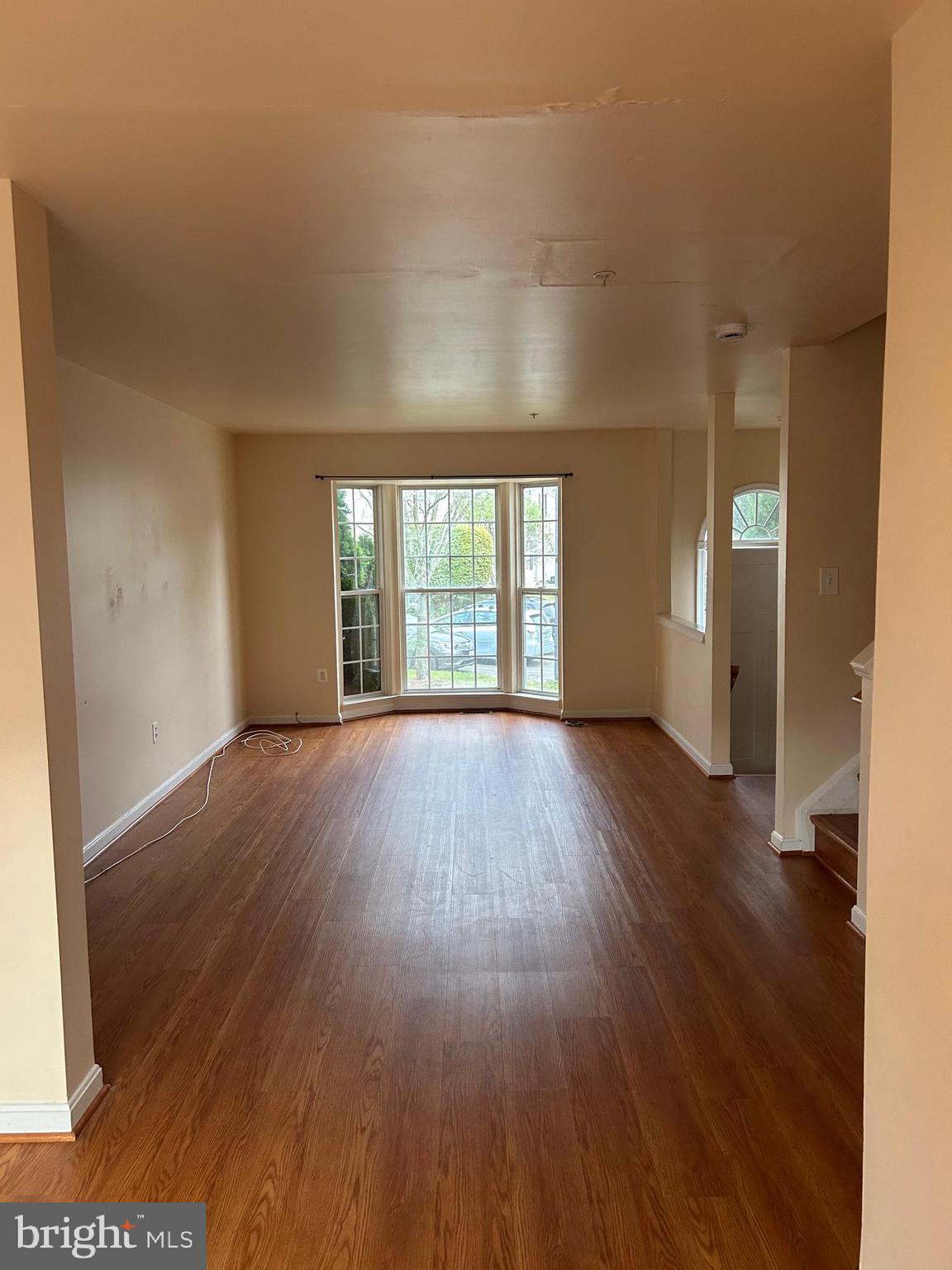 206 Arcadia Shores Circle Odenton, MD 21113 - Photo 3 of 15 wooden floor in an empty room with a window