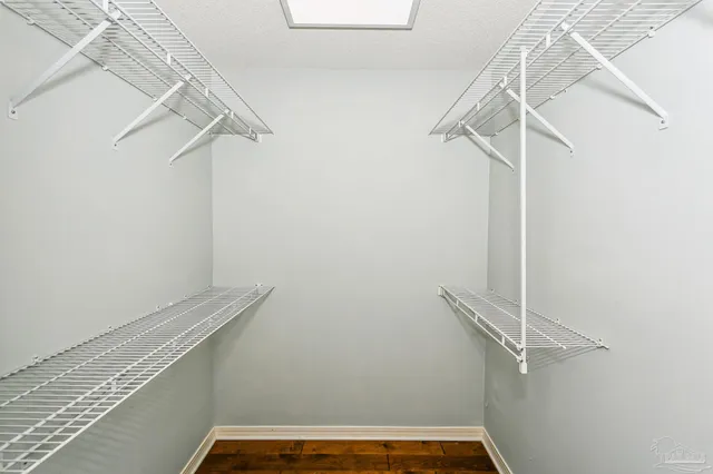 a view of small space with racks on the wall