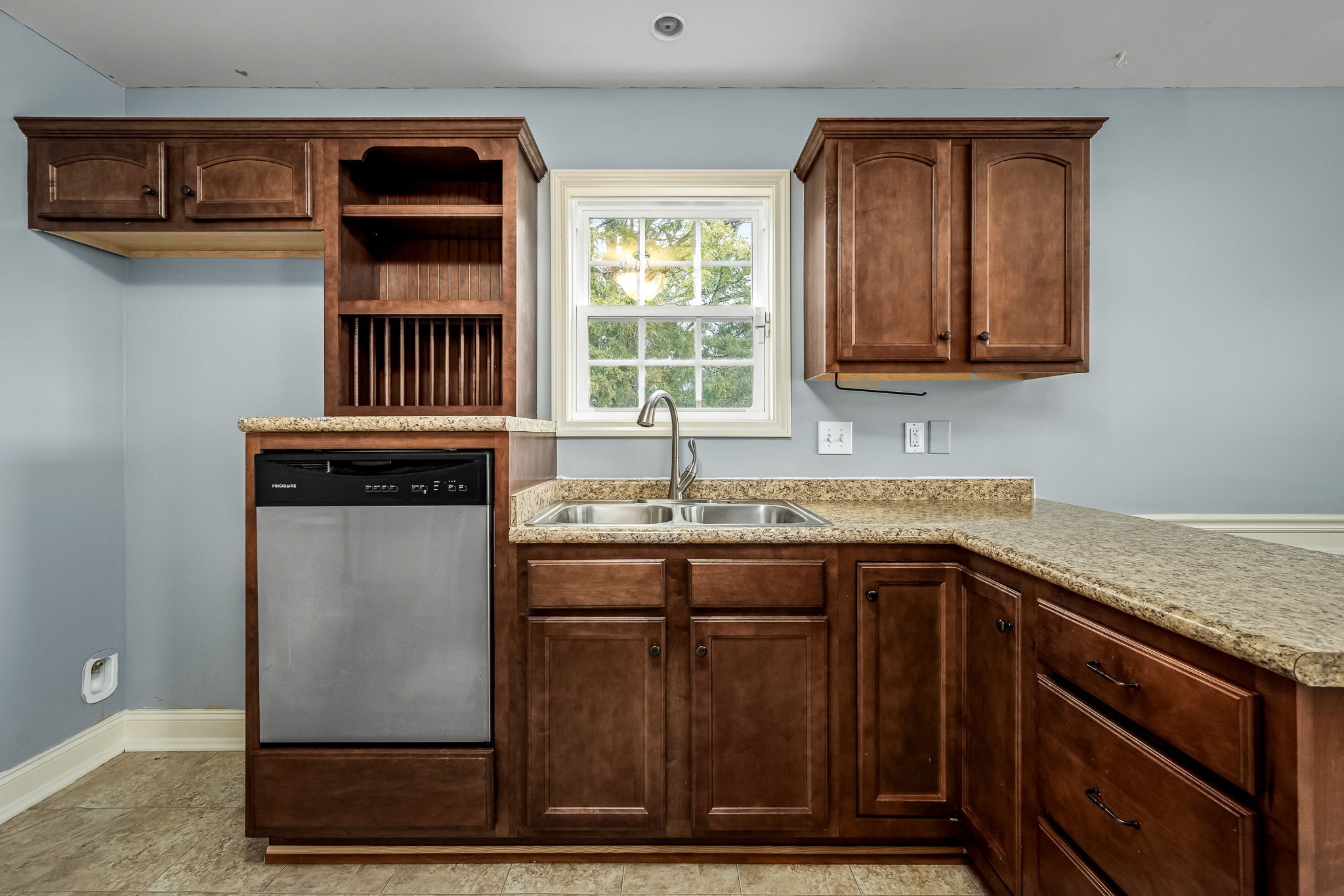 465 Crescent Road Murfreesboro, TN 37128 - Photo 13 of 31 a kitchen with granite countertop a sink and a stove