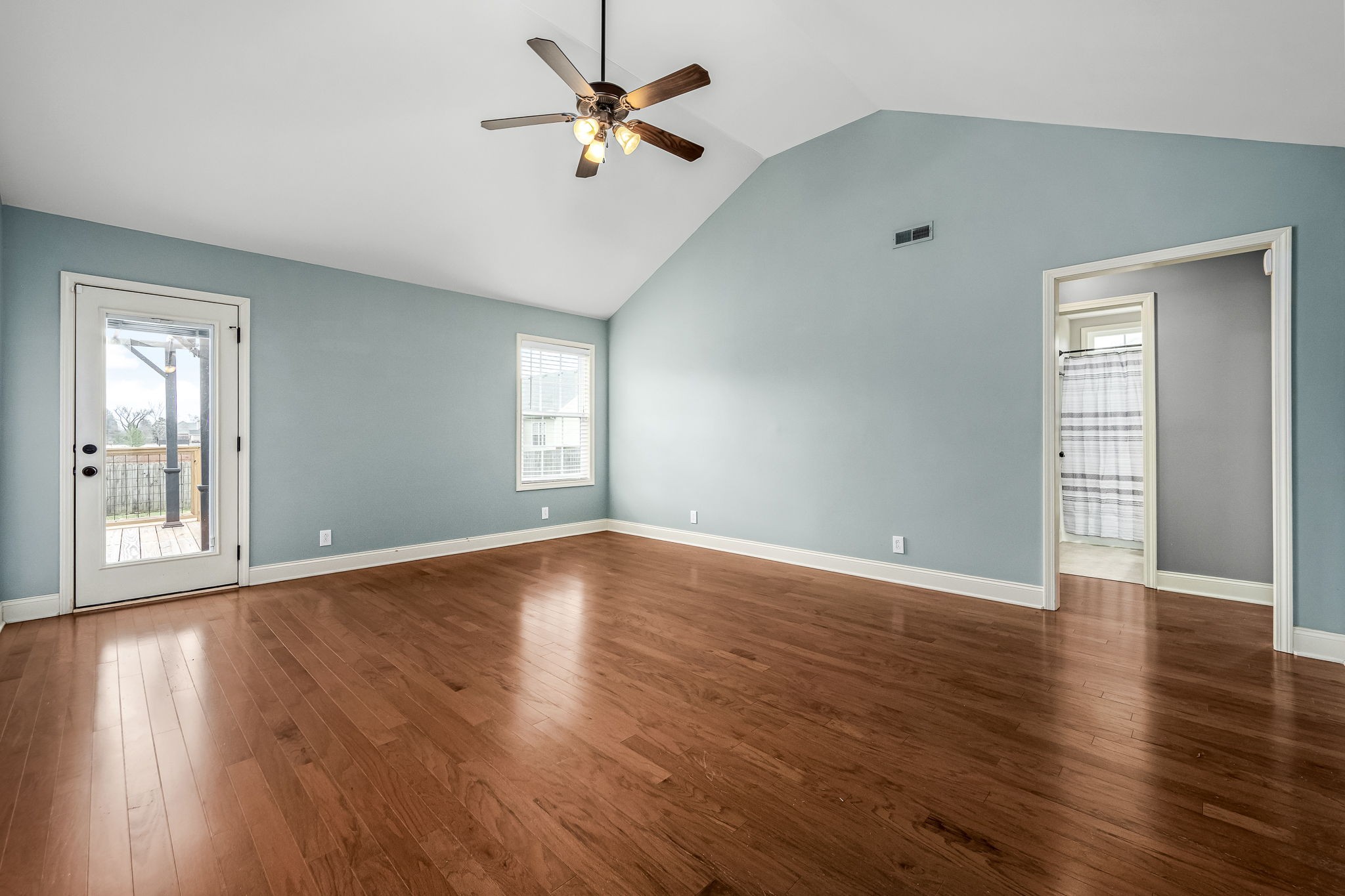 465 Crescent Road Murfreesboro, TN 37128 - Photo 6 of 31 a view of an empty room with wooden floor and a window