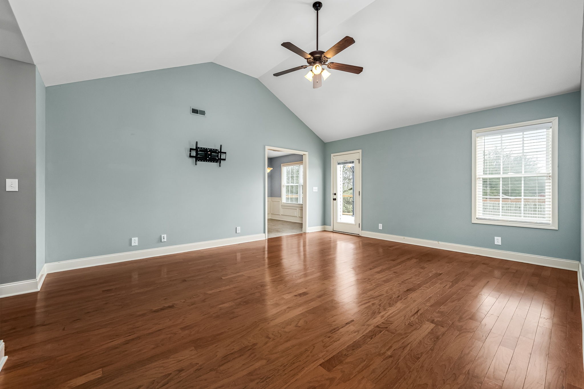 465 Crescent Road Murfreesboro, TN 37128 - Photo 8 of 31 a view of an empty room with wooden floor and a window