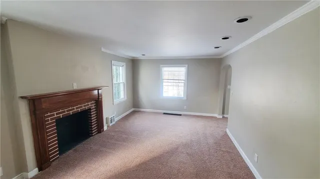a kitchen with stainless steel appliances granite countertop wooden floors and sink