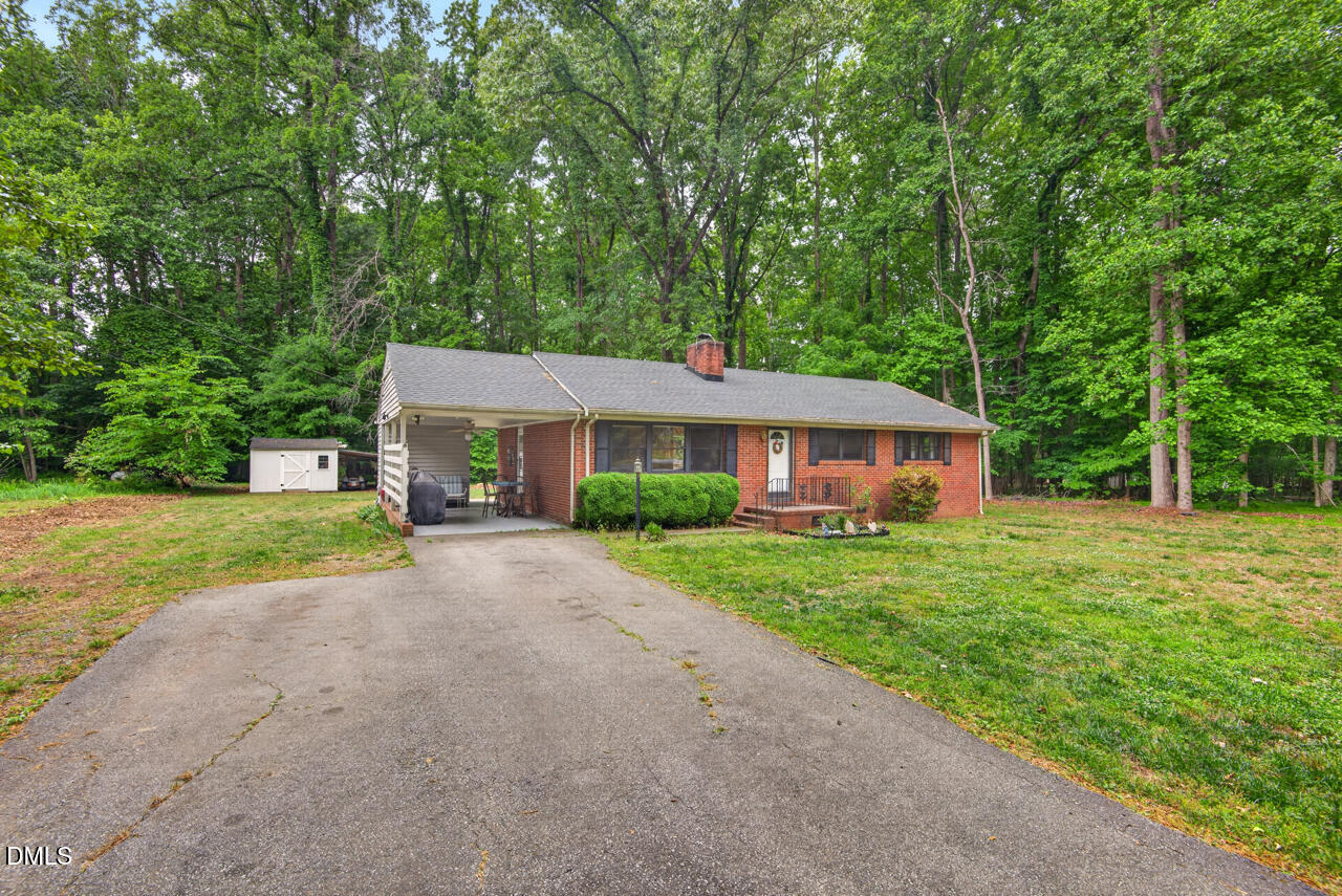 1420 Goodwin Road Durham, NC 27712 - Photo 52 of 54 a front view of a house with yard