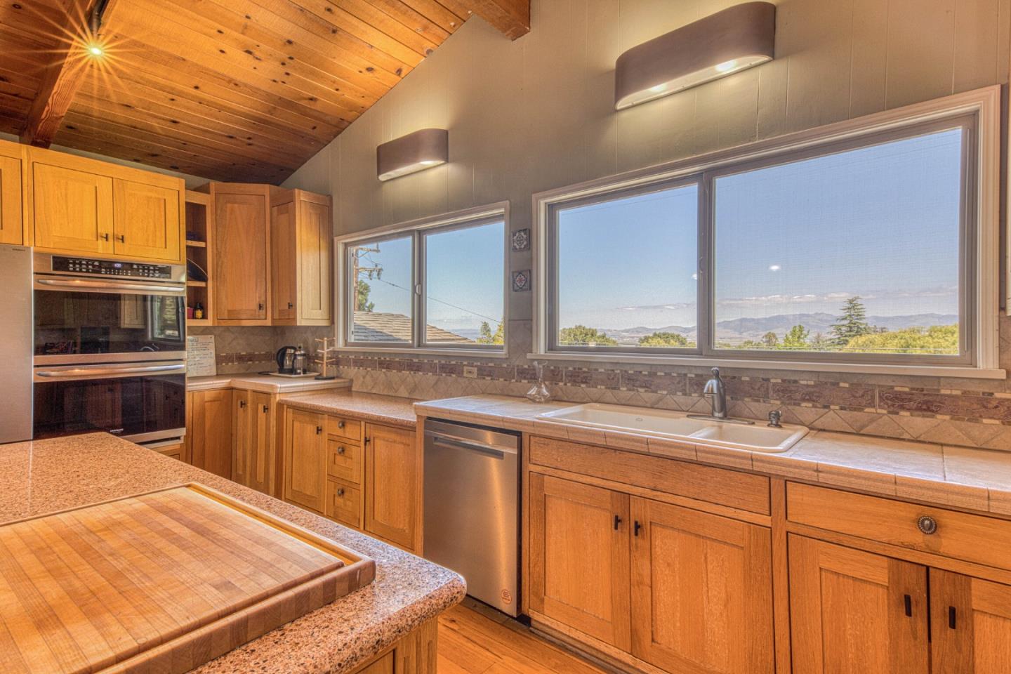394 Mesa Road Salinas, CA 93908 - Photo 15 of 53 a kitchen with a sink stove and cabinets