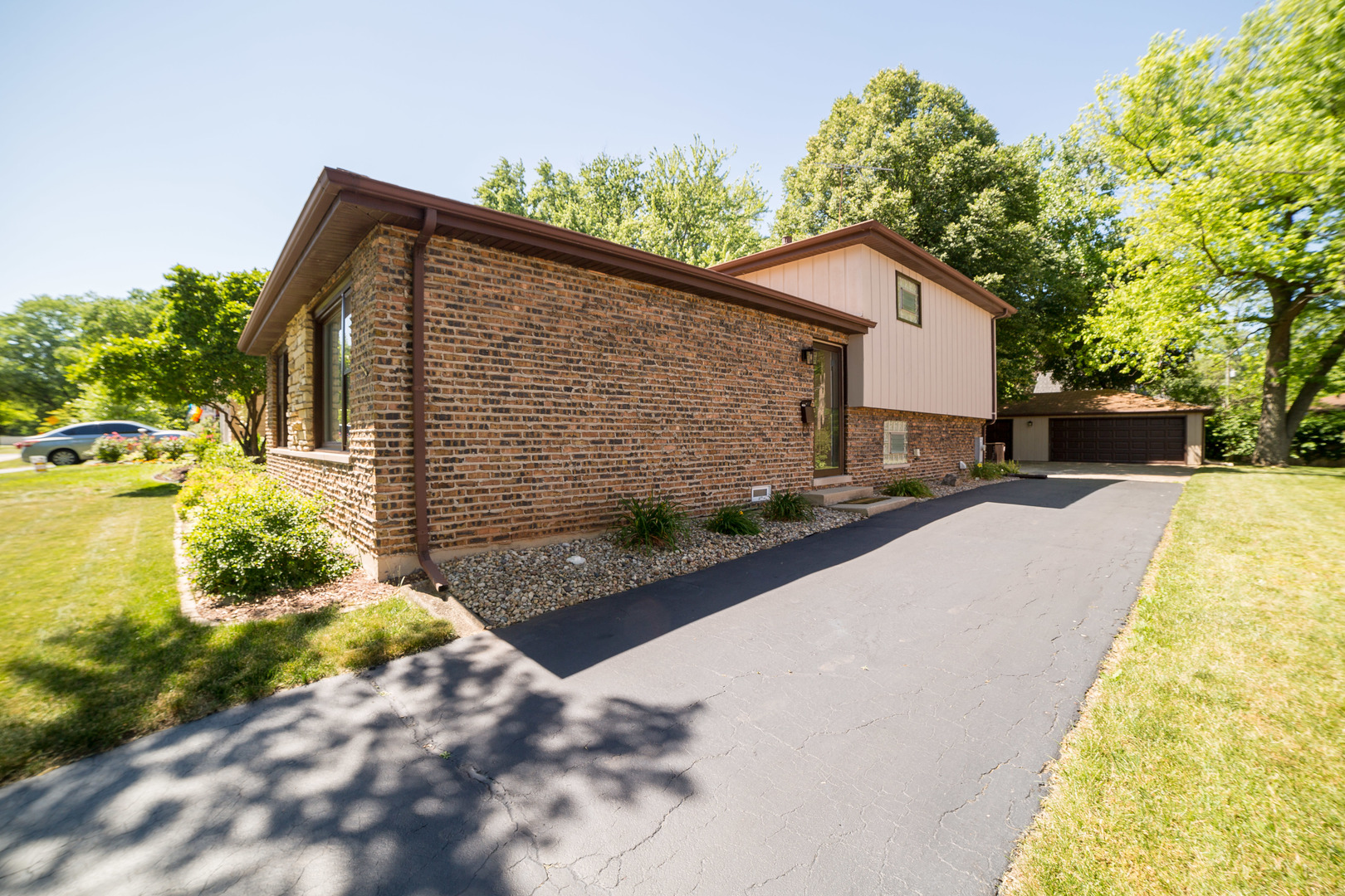 1258 Elder Road Homewood, IL 60430 - Photo 3 of 18 a front view of a house with a yard
