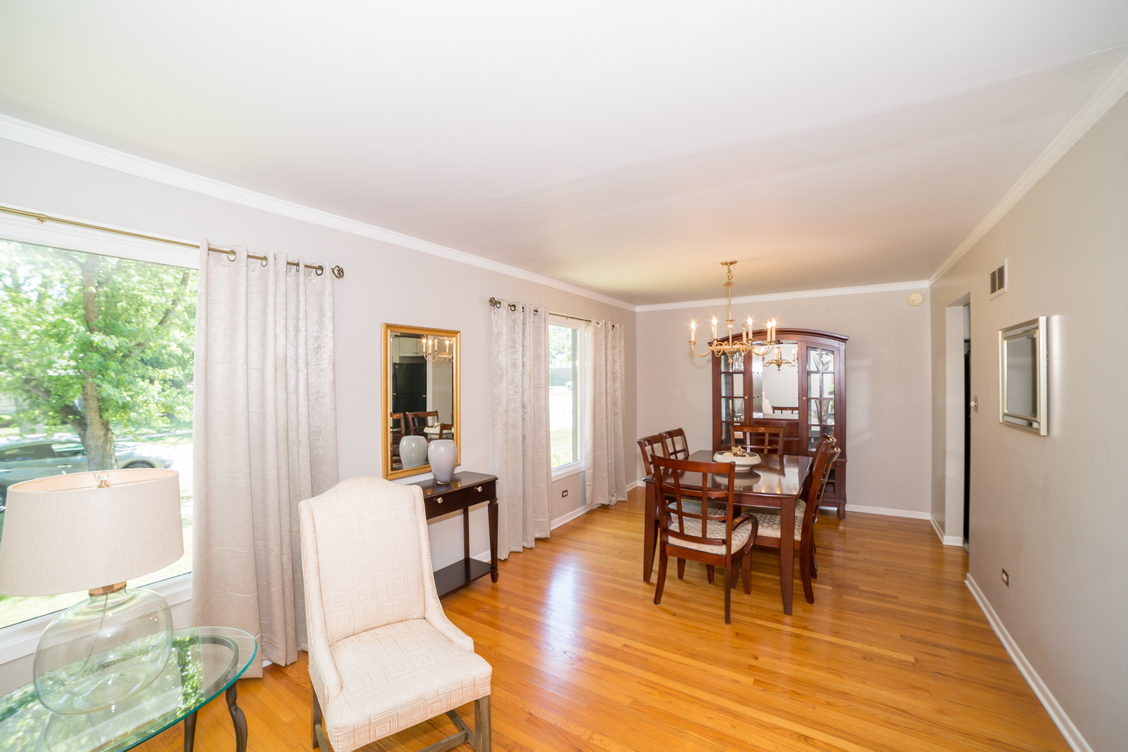 1258 Elder Road Homewood, IL 60430 - Photo 6 of 18 a dining room with furniture and wooden floor