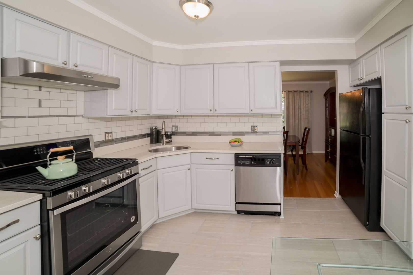 1258 Elder Road Homewood, IL 60430 - Photo 8 of 18 a kitchen with a stove and a refrigerator