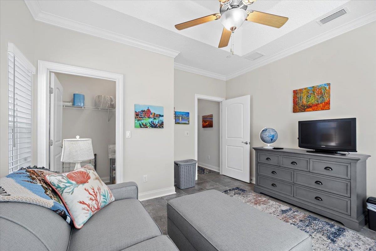 35 Timoga Trail St. Augustine, FL 32084 - Photo 24 of 52 a living room with furniture and a flat screen tv