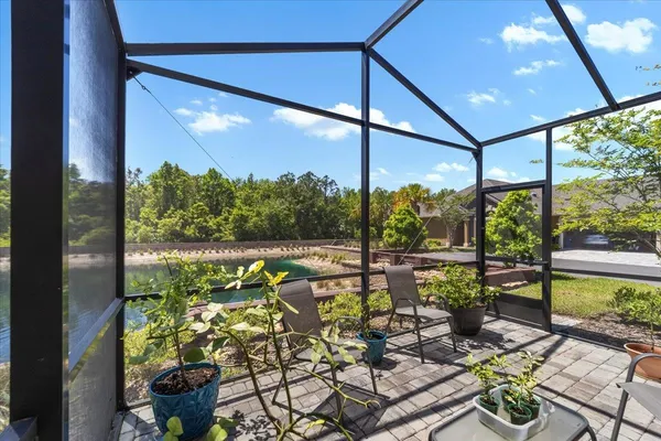 a front view of a house with a garden and yard