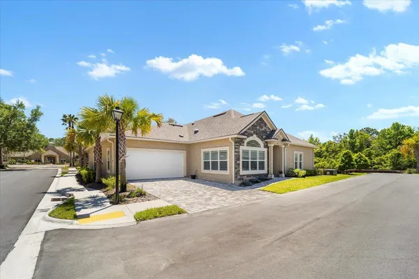 a view of lake with green space