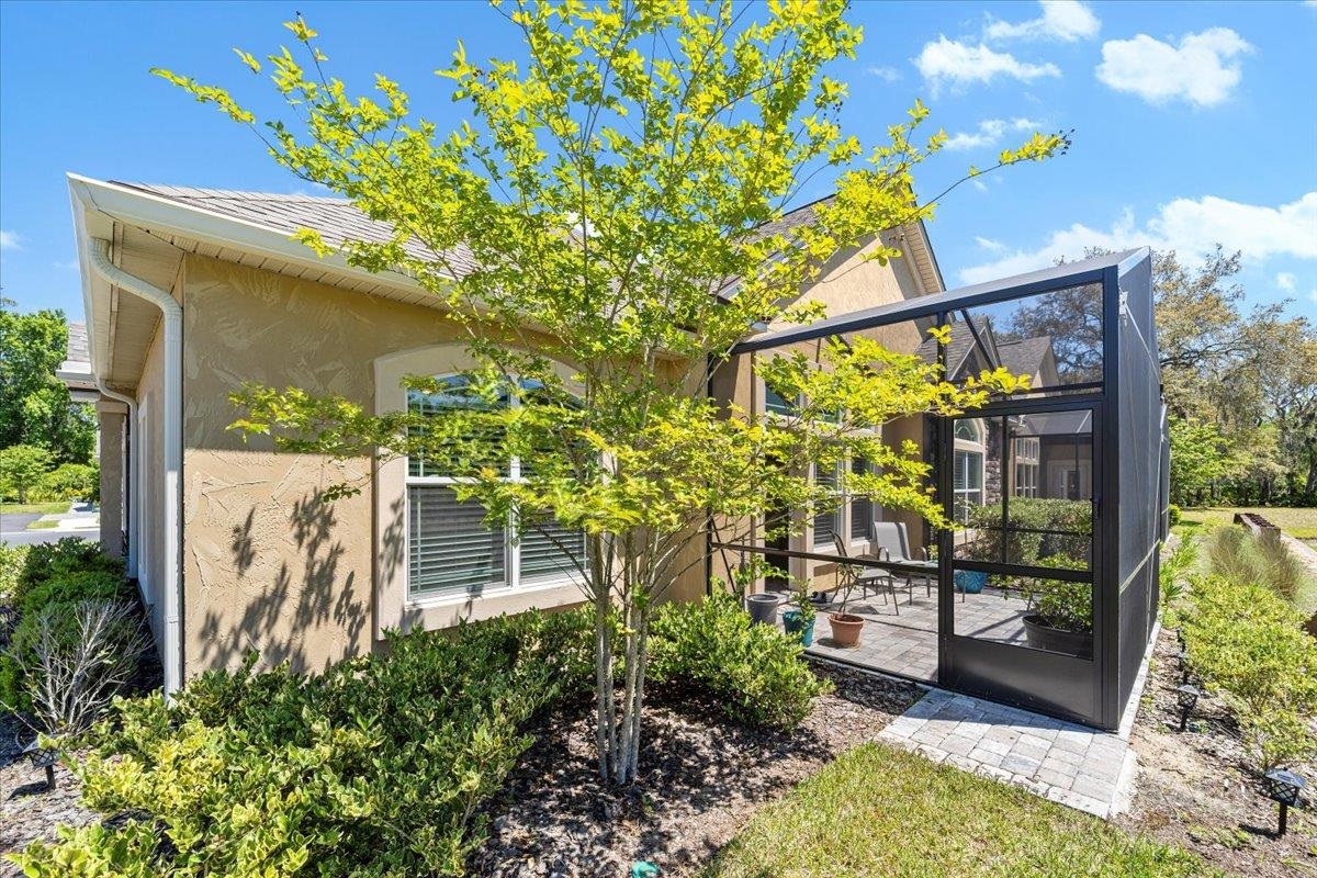 35 Timoga Trail St. Augustine, FL 32084 - Photo 47 of 52 a front view of a house with a garden