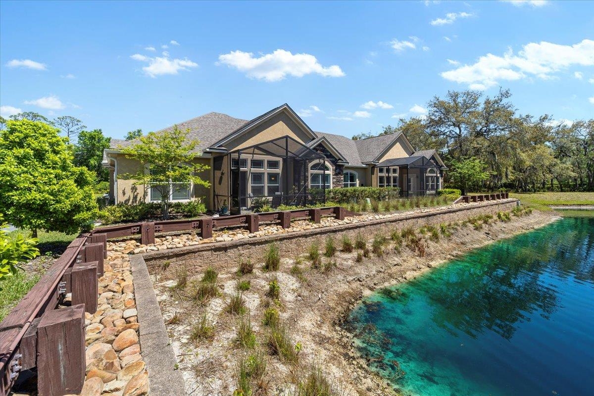 35 Timoga Trail St. Augustine, FL 32084 - Photo 49 of 52 a front view of house with yard and green space