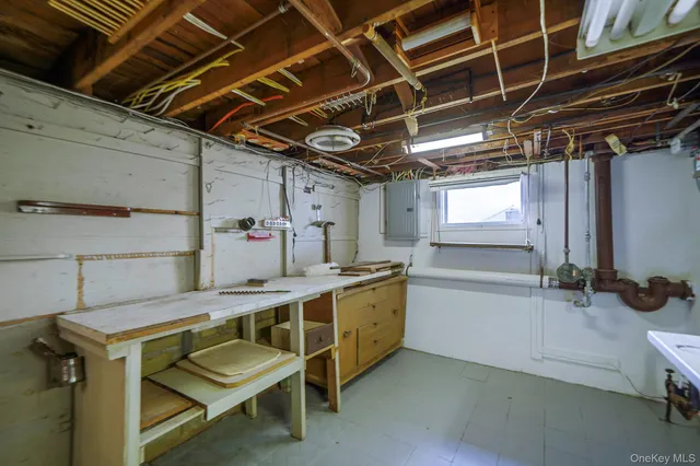 a kitchen with stainless steel appliances and wooden cabinets