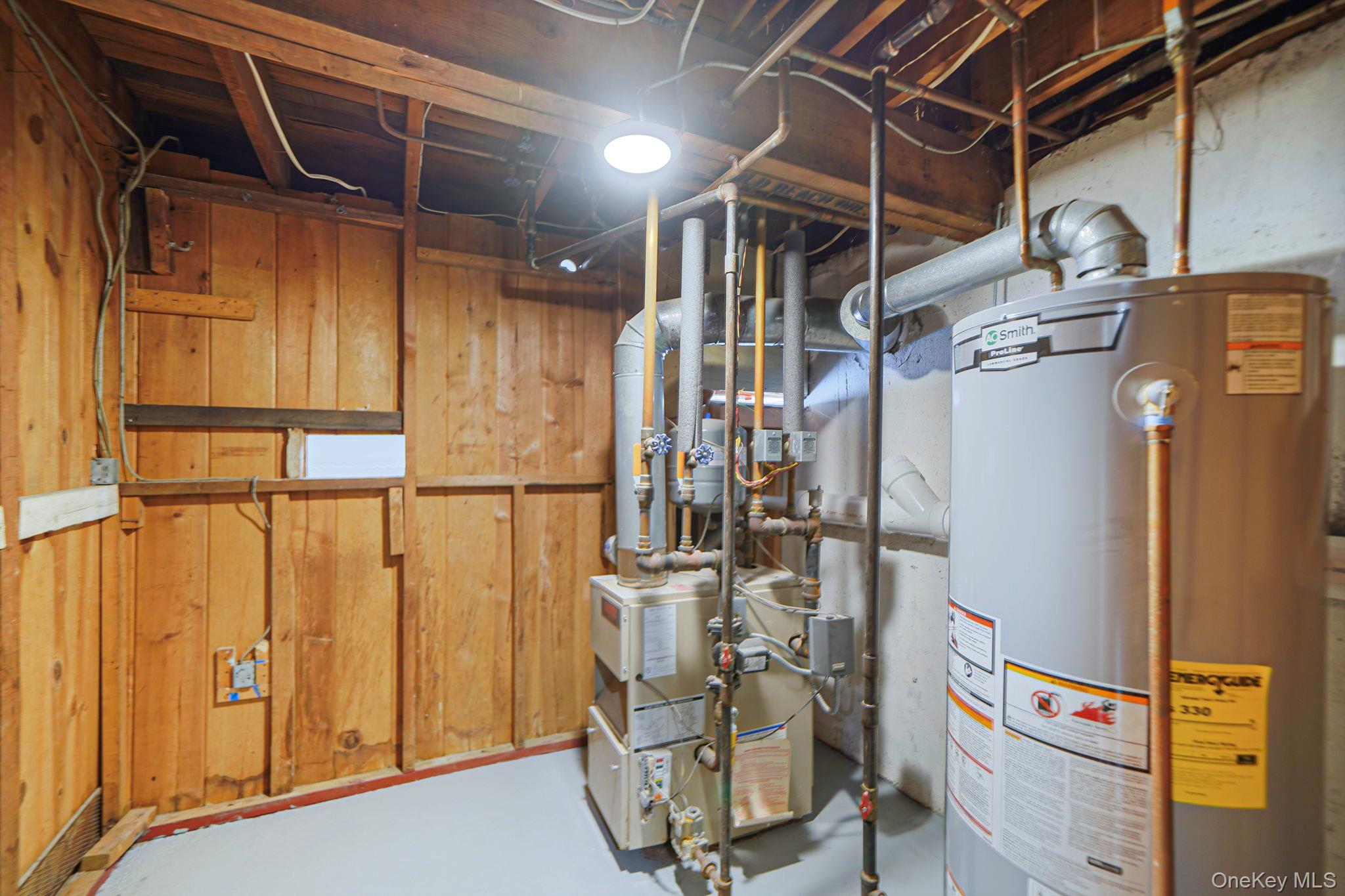 827 Aberdeen Road Bay Shore, NY 11706 - Photo 36 of 40 a view of a room with storage and utility room