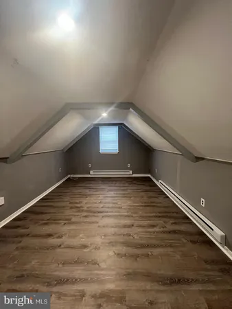 a view of a hallway with stairs