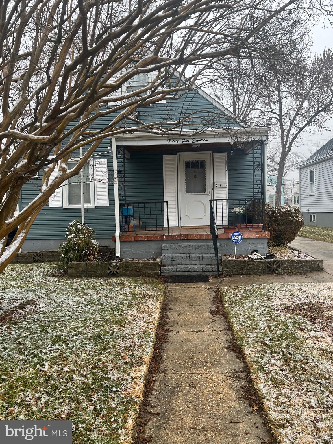 2518 Linwood Road Parkville, MD 21234 - Photo 2 of 27 a front view of a house with garden
