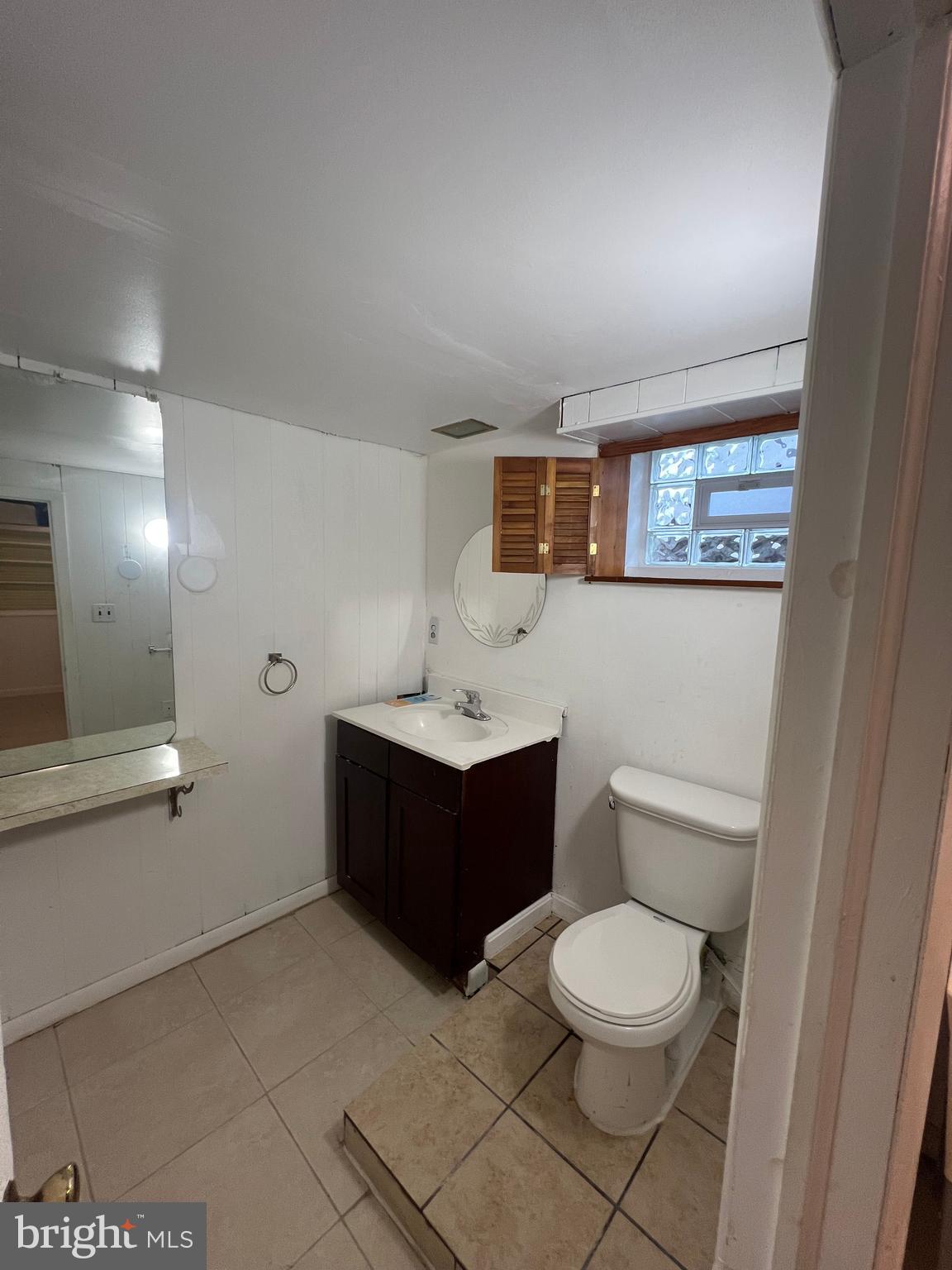 2518 Linwood Road Parkville, MD 21234 - Photo 25 of 27 a bathroom with a toilet a sink and bathtub