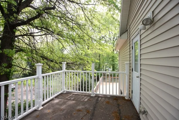 a view of a wooden fence and floor