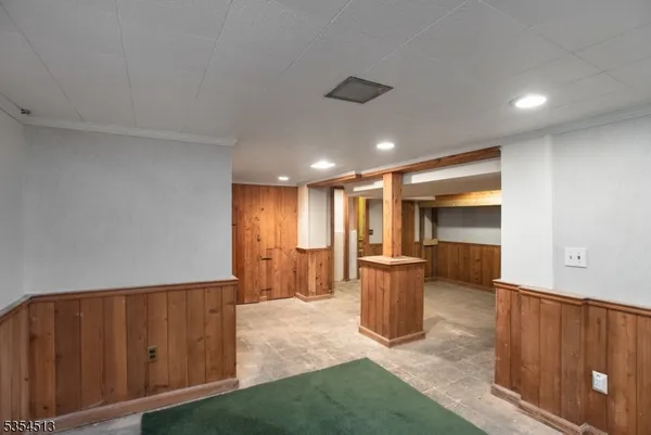 a kitchen with a refrigerator and a sink