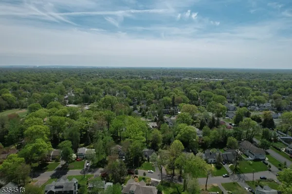 an aerial view of a city with lots of residential buildings