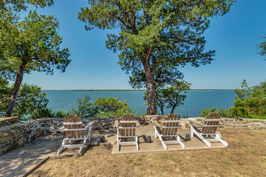 111 Live Oak Road Whitney, TX 76692 - Photo 17 of 30 Relax on your Adirondack chairs and enjoy nature.