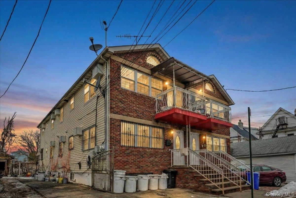 a view of a house with a street