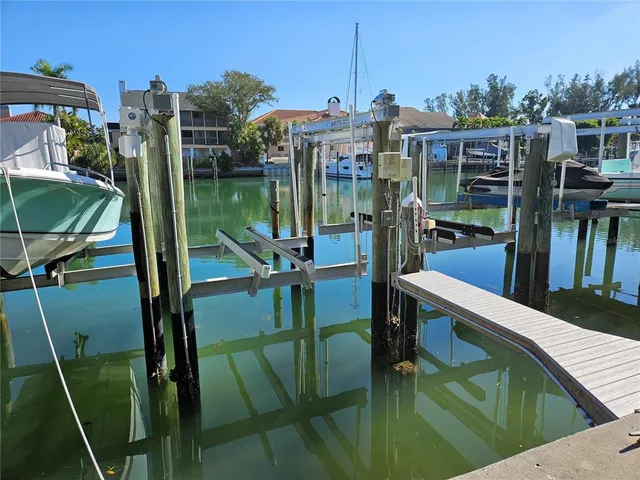 a view of a balcony with chairs
