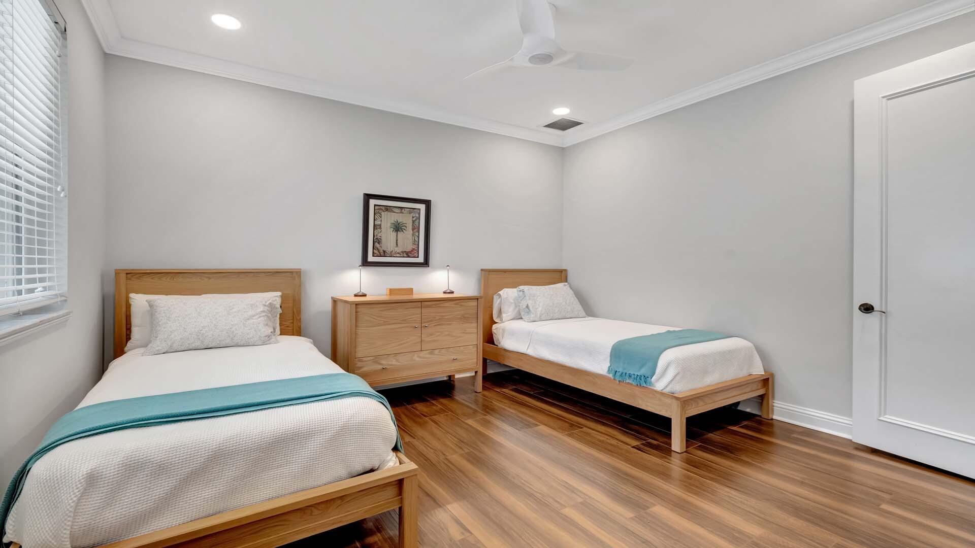 514 Northwest 13th Street Delray Beach, FL 33444 - Photo 26 of 35 a room with two bed and a lamp on desk