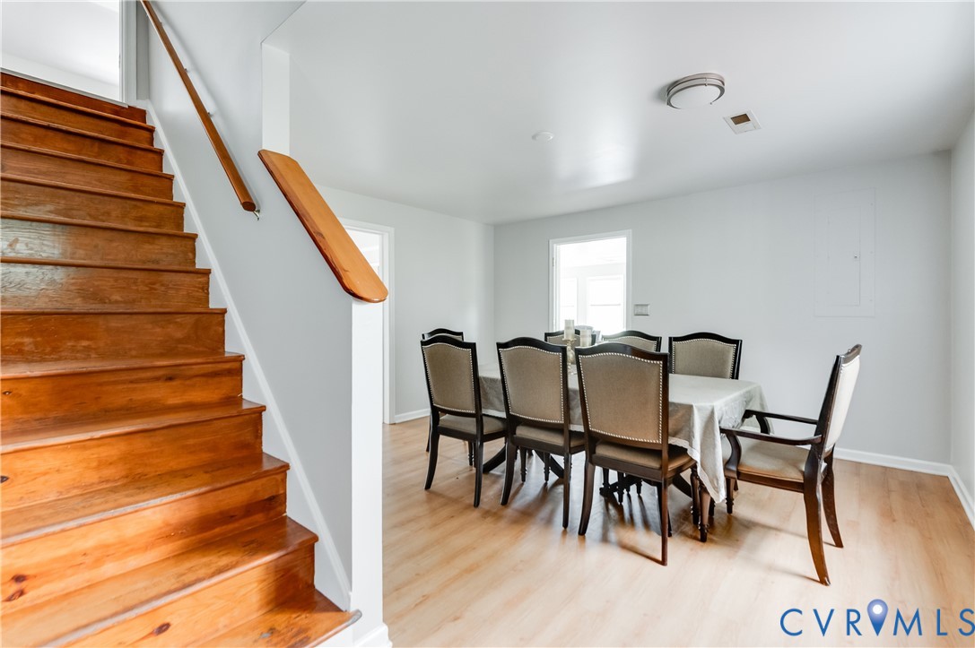 1474 Welsh Tract Road Charlotte Court House, VA 23923 - Photo 13 of 48 Hardwood staircase with natural wood handrail, lig