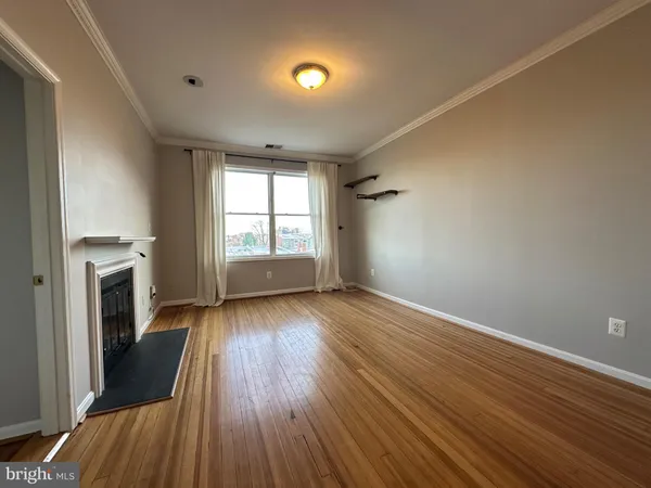 a kitchen with a refrigerator and a sink