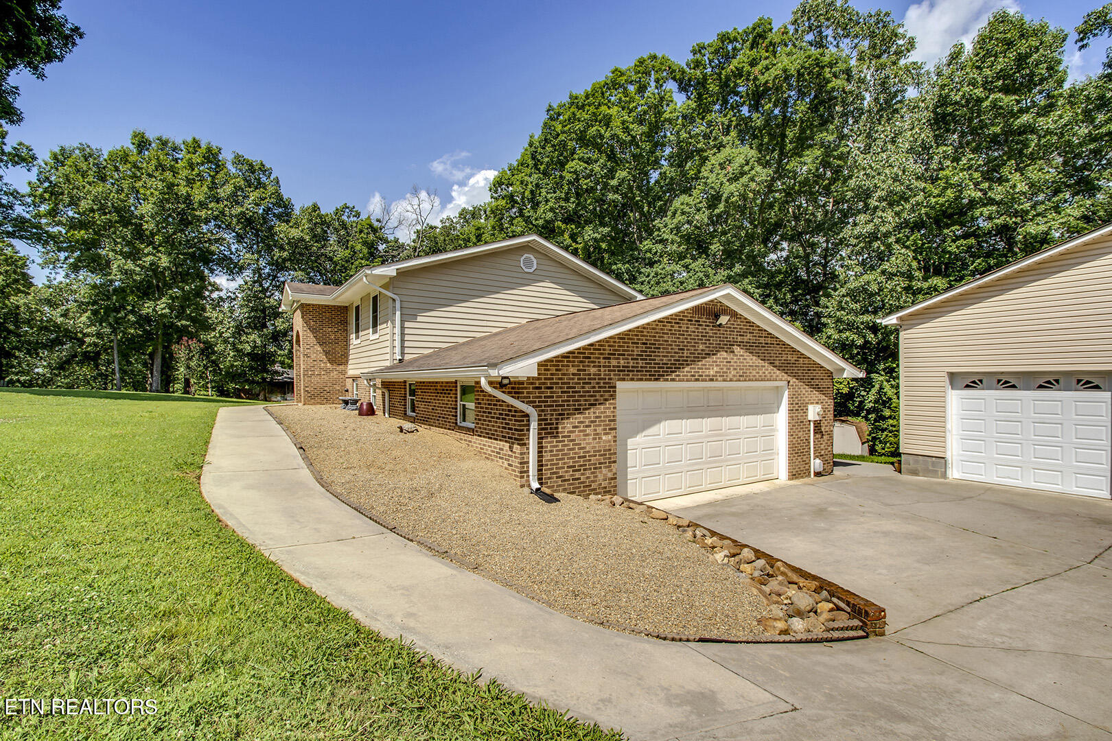145 Van Stowe Road Harriman, TN 37748 - Photo 4 of 60 04_VanStoweRoad_145_GarageSide