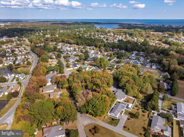 an aerial view of residential building with parking space