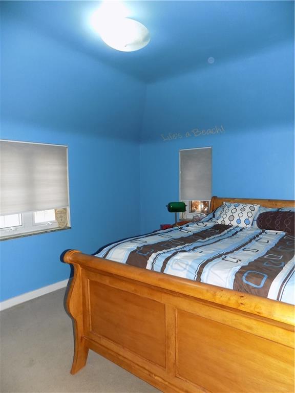 2011 Brookfield Road Pittsburgh, PA 15243 - Photo 13 of 17 a bed sitting in a bedroom next to a window