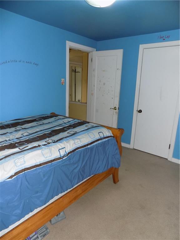 2011 Brookfield Road Pittsburgh, PA 15243 - Photo 14 of 17 a bedroom with a bed and a window