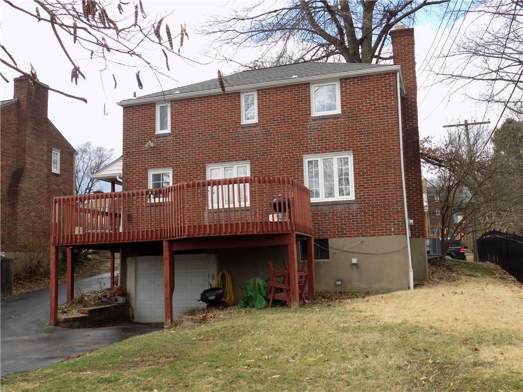 2011 Brookfield Road Pittsburgh, PA 15243 - Photo 15 of 17 a front view of a house with garage