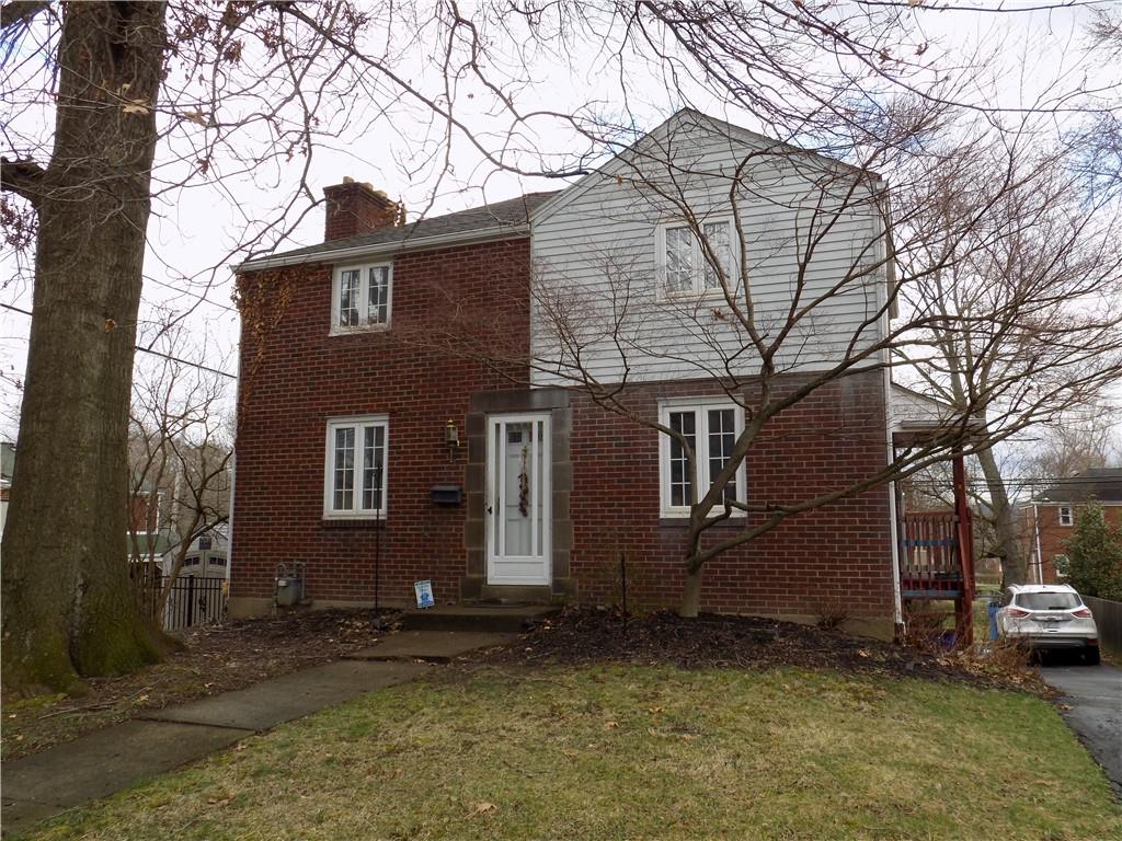 2011 Brookfield Road Pittsburgh, PA 15243 - Photo 2 of 17 a view of a house with a yard and tree